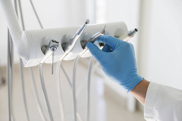 Professional Tooth Extraction technician working in Tavares, FL